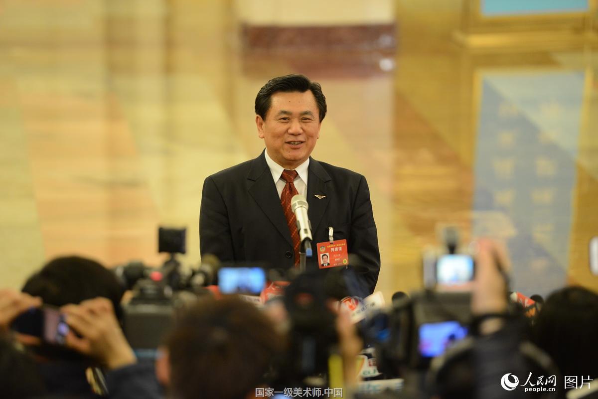 全国政协十二届五次会议开幕会:中国民用航空局局长冯正霖接受采访