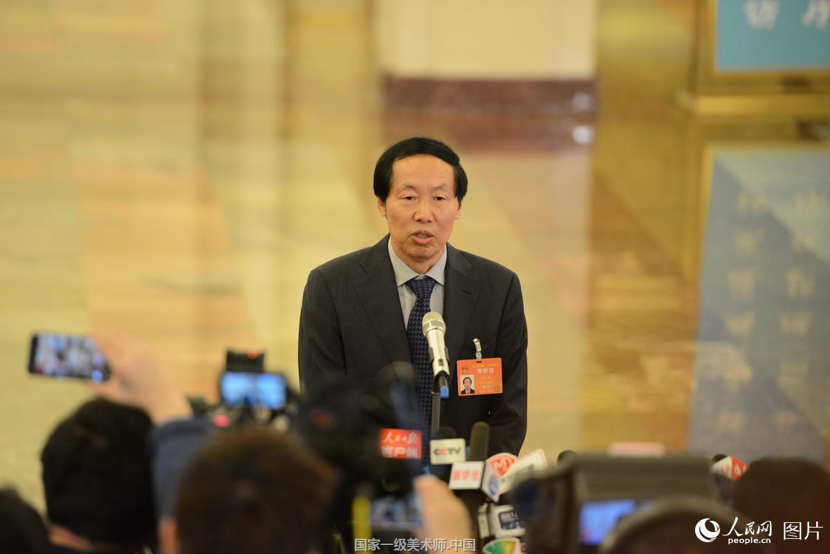 全国政协十二届五次会议开幕会:国家文物局局长刘玉珠接受采访